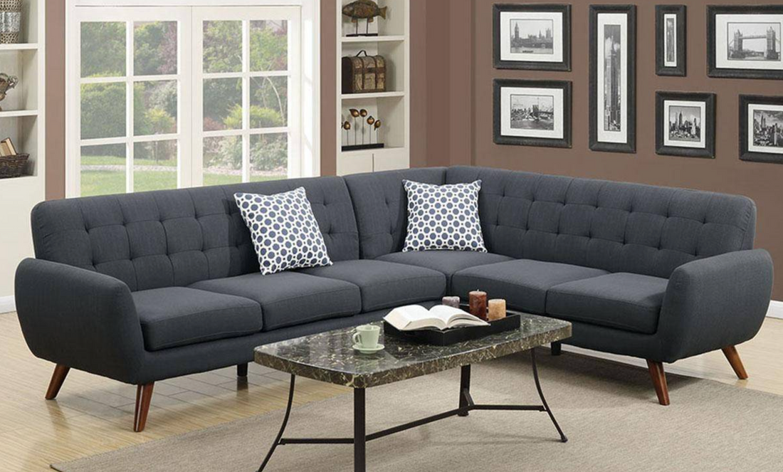 Retro style sectional with accent pillows.
